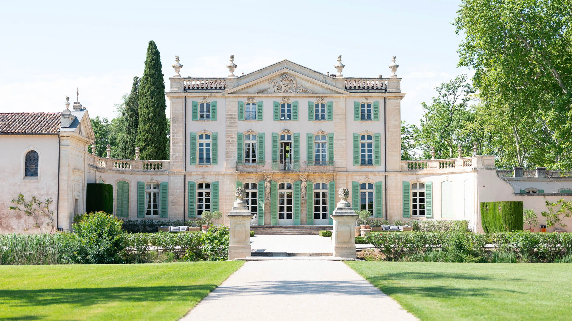 Private Provençal château estate with landscaped gardens and symmetrical stone architecture